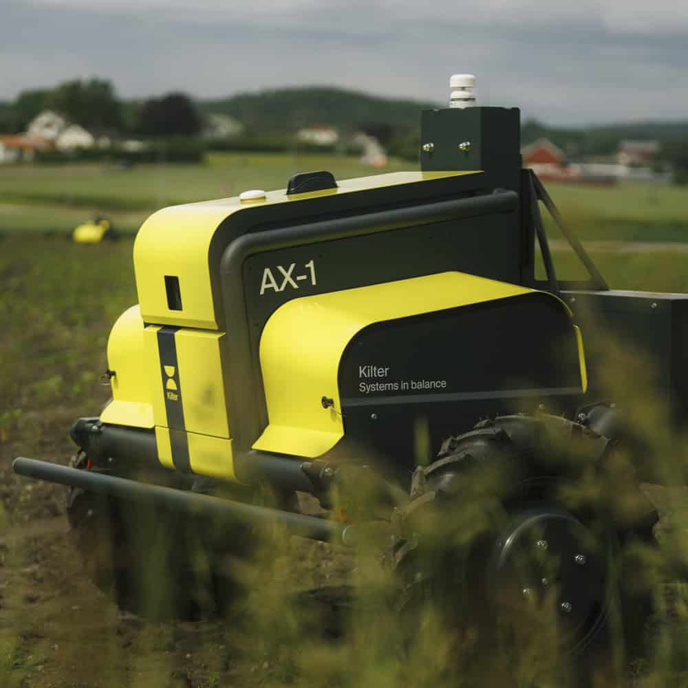 Agricultural robot AX-1 for precision farming in fields.